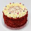 Luxury red velvet handcrafted birthday cake with star sprinkles
