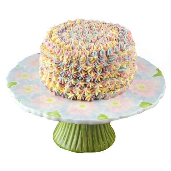 Colourful luxury pinata birthday cake with italian meringue buttercream