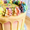 Close up of rainbow colourful pinata birthday cake