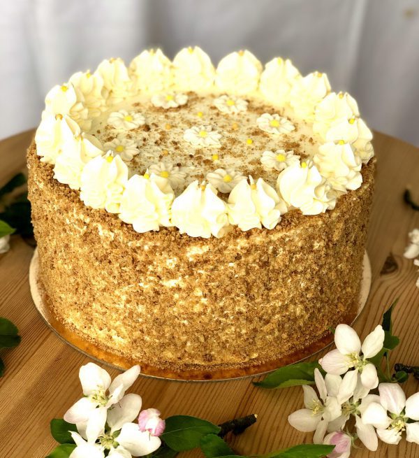Luxury handcrafted golden honey cake with icing