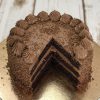 Sliced handcrafted gourmet chocolate ganache cake