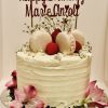 Handmade french macaron and strawberry celebration cake
