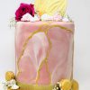 Pink marble and macarons cake