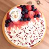 Handcrafted gourmet strawberry and vanilla cake with berries