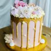Showstopping handmade pink and gold birthday drip cake